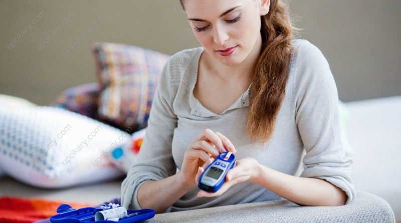 girl with glucose meter