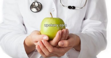 doctor holding apple